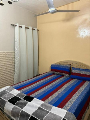 Fully Furnished bedroom with shared bathroom in a villa sharjah